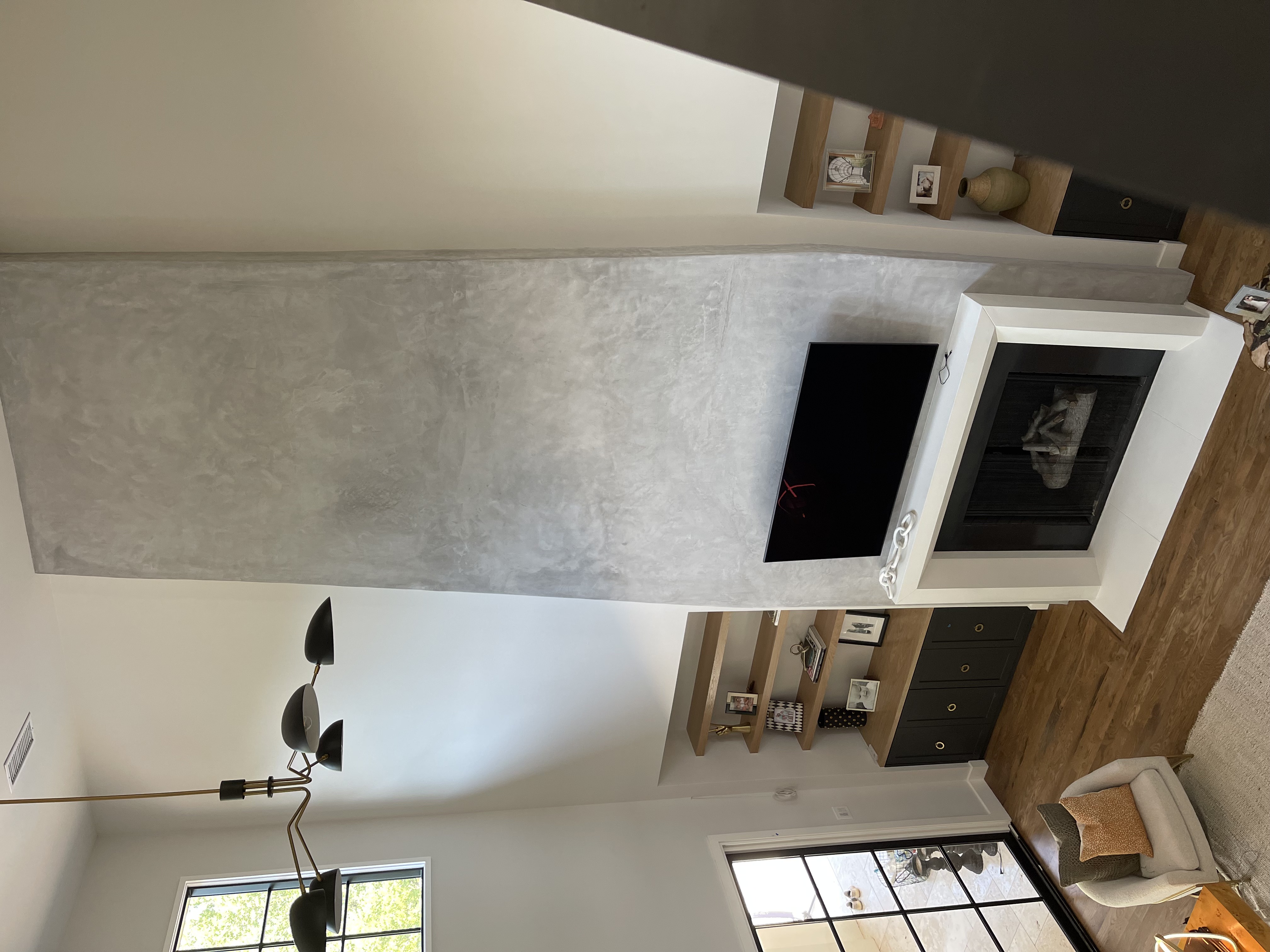 Custom cast stone fireplace mantel in Dallas–Fort Worth home by Cast Design Fireplaces